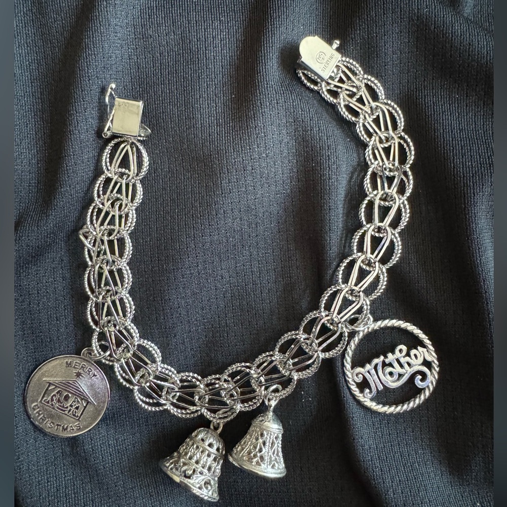 Vintage charm bracelet bells chime nativity and mother charm - charm bracelet